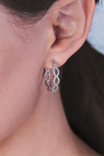 Load image into Gallery viewer, Ceejayeff diamond Marq hoop earring in white gold on a model