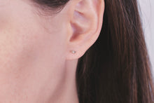 Load image into Gallery viewer, Ceejayeff single diamond Marq stud earring in rose gold on a model