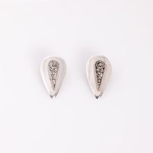 Load image into Gallery viewer, Pair of silver earrings with intricate designs on a white background