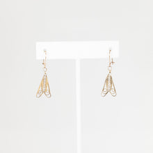 Load image into Gallery viewer, Gold earrings on a white card with a white background