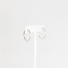 Load image into Gallery viewer, Silver hoop earrings on a white background