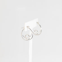 Load image into Gallery viewer, Silver hoop earrings on a white background