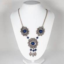 Load image into Gallery viewer, Necklace with blue stones on a white mannequin bust against a gray background
