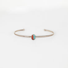Load image into Gallery viewer, Silver bracelet with a red and blue bead on a white background