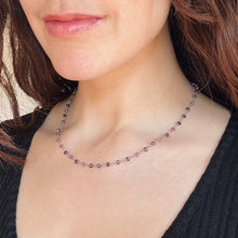 Load image into Gallery viewer, Necklace with purple beads worn by a person