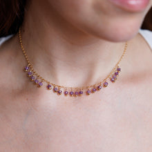 Load image into Gallery viewer, Necklace with purple gemstones worn by a person