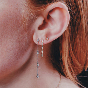 Ceejayeff long star diamond chain earring multi Marq diamond dangle earring and long star stud all on a model