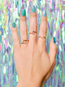 Ceejayeff diamond gold bypass rings on a hand