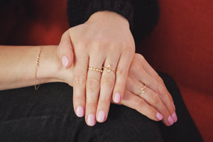 Ceejayeff Model wearing delicate gold and diamond jewelry