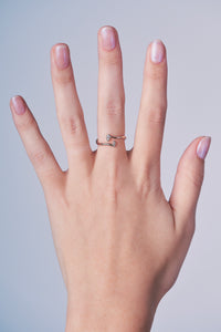 Ceejayeff pear Marq diamond bypass ring in rose gold on a hand