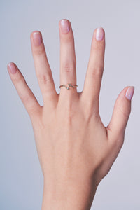 Ceejayeff star Marq diamond gold bypass ring on a hand